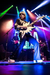 PHOTO ABBA Zach star guitar blue outfit multicoloured lights Auckland 211218 - MHP12 Lowered Resolution